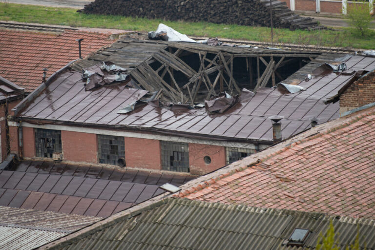Broken,And,Destroyed,Roof,Of,An,Old,Abandoned,Industry,,In