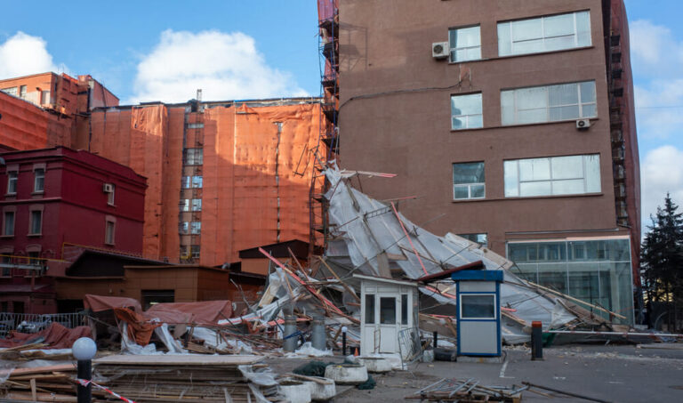 Scaffolding,Collapsed,From,A,Strong,Wind,Near,A,Reconstructed,Multi storey