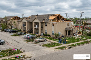 tornado house damage to multifamily apartment complex after storm