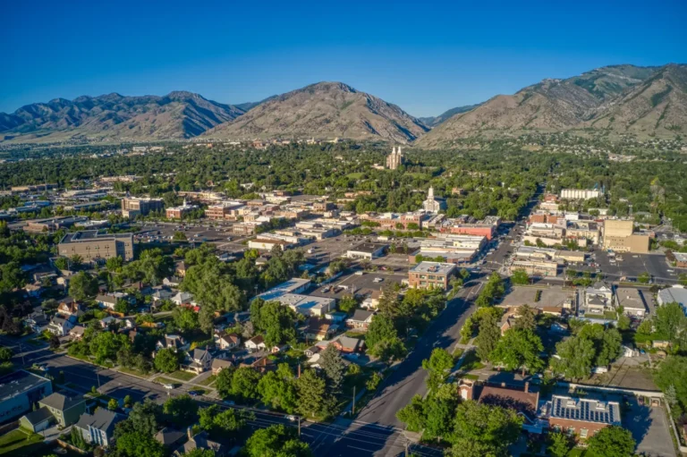Logan cityscape with mountains behind downtown