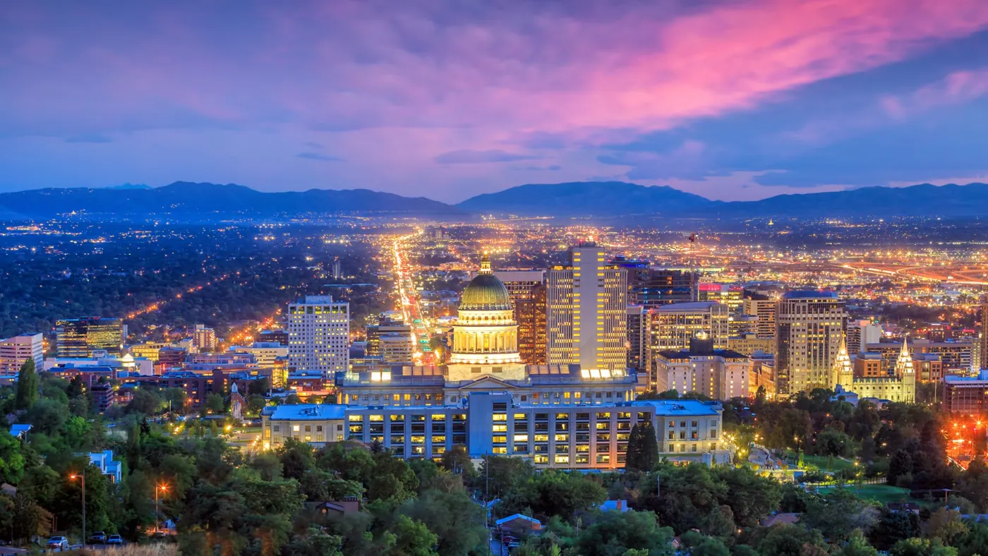 Salt Lake City skyline and Utah State Capitol at dusk
